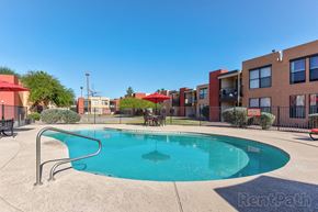 Casa Grande apartment for rent - A swimming pool in a residential area with a RentPath logo.