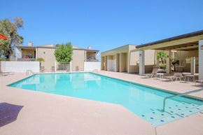 Casa Grande apartment for rent - A swimming pool in front of a house.