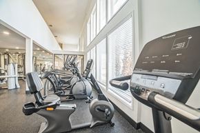 Las Vegas apartment for rent - A gym with treadmills, elliptical machines, and other exercise equipment.