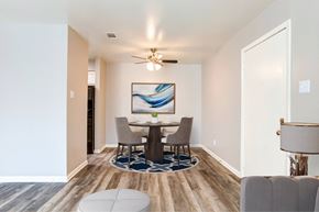 Little Rock apartment for rent - A dining room with a table and chairs.