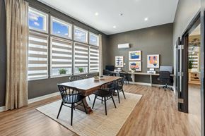 Johnstown apartment for rent - A modern dining room with a large table and chairs.