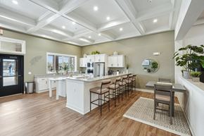 Johnstown apartment for rent - A kitchen with white cabinets and a wooden floor.