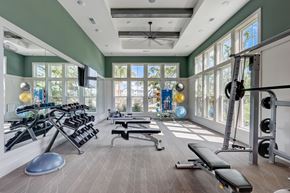 Apopka apartment for rent - the home gym has plenty of exercise equipment and windows