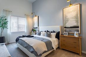 Nashville apartment for rent - a bedroom with a bed and a dresserat Sterling Nashville West Apartments, Nashville, 37209