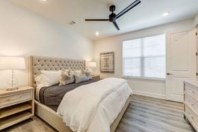 Santa Rosa Beach apartment for rent - a bedroom with a bed and a ceiling fan