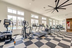 Santa Rosa Beach apartment for rent - a gym with cardio equipment and large windows