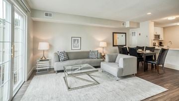 Westborough apartment for rent - a living room and dining room with a couch and a table