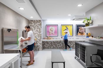 A man and a woman in a kitchen