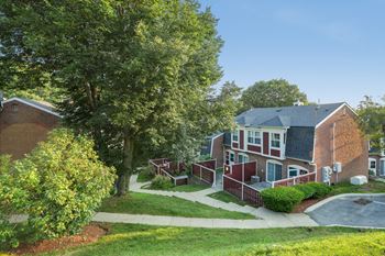 Ourcommunity-meticulous landscaping with lovely woods