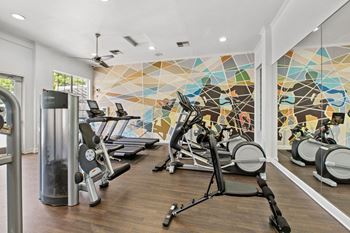 24 Hour fitness center with cardio and weights