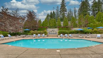 Resort-style pool with spa and sundeck