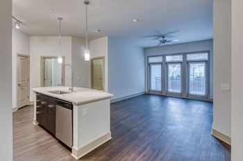 Modern kitchen with custom cabinetry and lighting