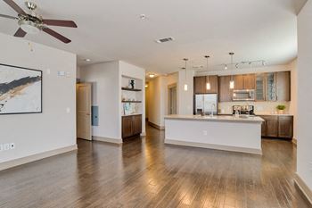 Modelhomes- custom maple cabinetry with 42'' upper cabinets and glass front displays