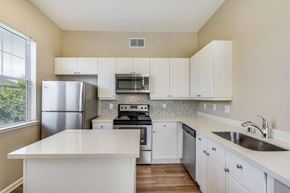 Fremont apartment for rent - Open-Concept Kitchens with Quartz Countertops and Stainless Steel Appliances at The Estates at Park Place, Fremont, California
