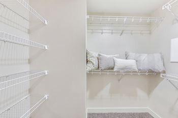 Modelhomes-spacious closets with built-in shelving