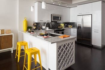 Modelhomes-chef-inspired kitchens with stainless steel appliances