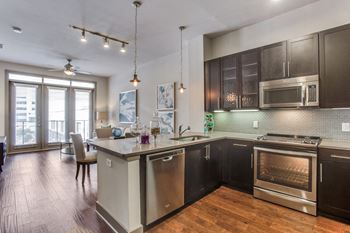Modelhomes-spacious kitchen with large maple cabinets