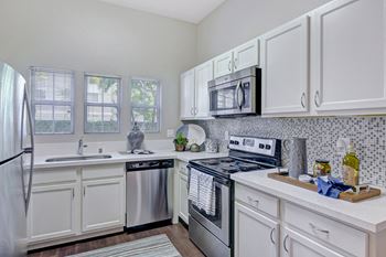 Modelhomes-custom dark espresso or white cabinetry