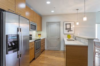 Modelhomes-modern kitchens with stainless steel appliances