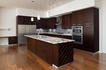 Modelhomes-european cabinetry with soft-close drawers and doors with 42" upper cabinets