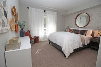 Spacious bedroom with comfortable bed
