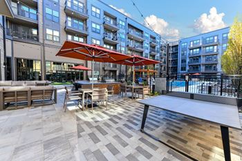 Poolside grill & picnic tables
