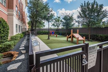 Amenities-enclosed pet park with obstacle course
