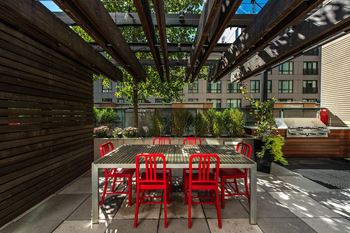 Amenities-outdoor gathering space with bbq grills