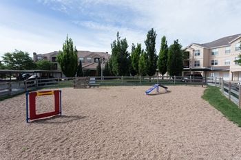 Amenities-dog park with sand, grass, and obstacles