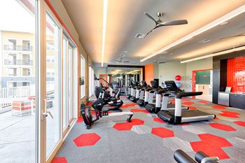 Wellness center with club-quality fitness equipment, spin bikes and yoga studio