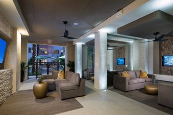 Amenities-covered, outdoor lounge with conversational seating