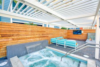 Spa with seating and tv nearby