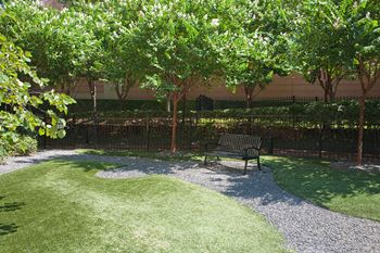 Amenities-enclosed dog park equipped with k9 grass (r)