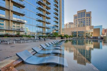 Amenities-4th floor amenity deck with infinity edge pool, private cabanas and putting green