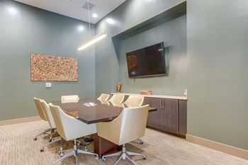 Amenities-24-hour conference room with large screen