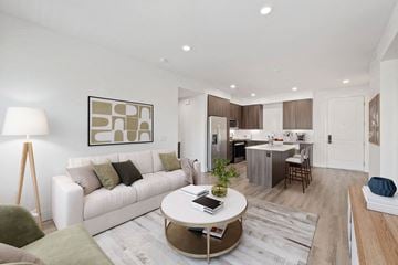 San Diego apartment for rent - a living room with a couch and a table