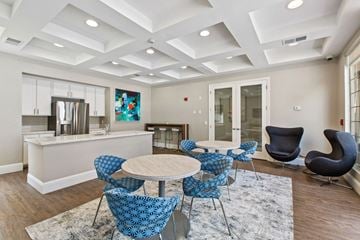 San Jose apartment for rent - a living room with a kitchen and a table and chairs