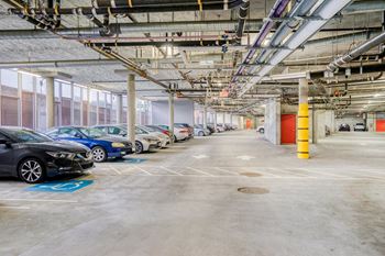 Enclosed parking garage with controlled access