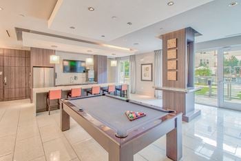 Hdtv lounge with billiards