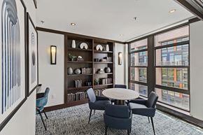 Alexandria apartment for rent - a meeting room with a table and chairs and a large window