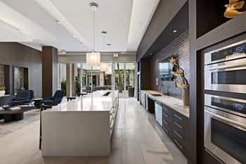 Catering kitchen lounge with bar top seating