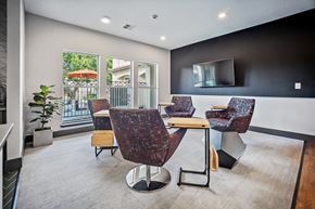 Westminster apartment for rent - the reserve at city center spacious conference room with table and chairs
