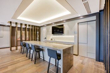 Sophisticated resident lounge with a double-sided fireplace