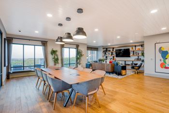 Sky club with entertainment kitchen and gathering space