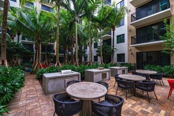 Outdoor dining area at windsor ludlam trail in miami, fl.