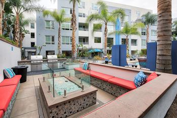Amenities-poolside lounge with a fire pit