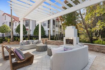 Outdoor lounge area with fireplace