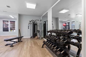 24-Hour fitness center equipped with cardio and strength training equipment