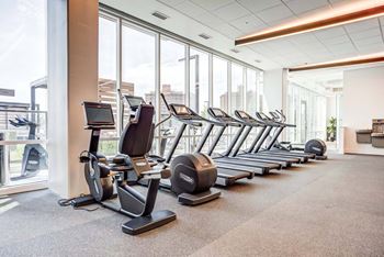 Health club with cardio and strength training equipment