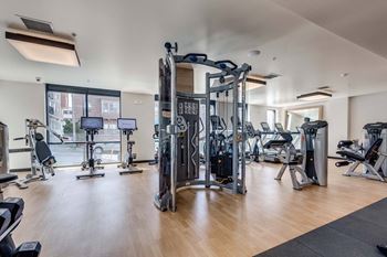 Fitness center with cardio and cable machines